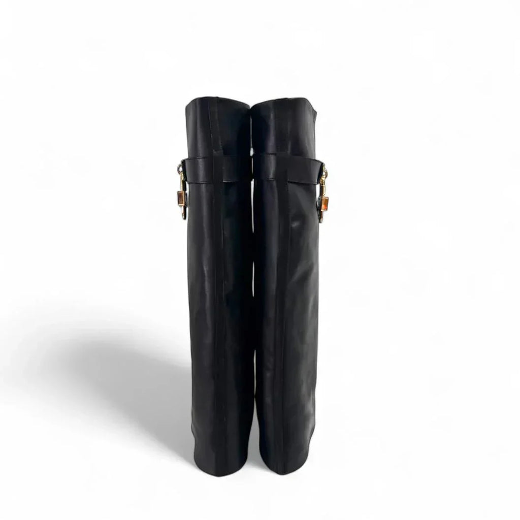 Leather boot with fold and gold charm